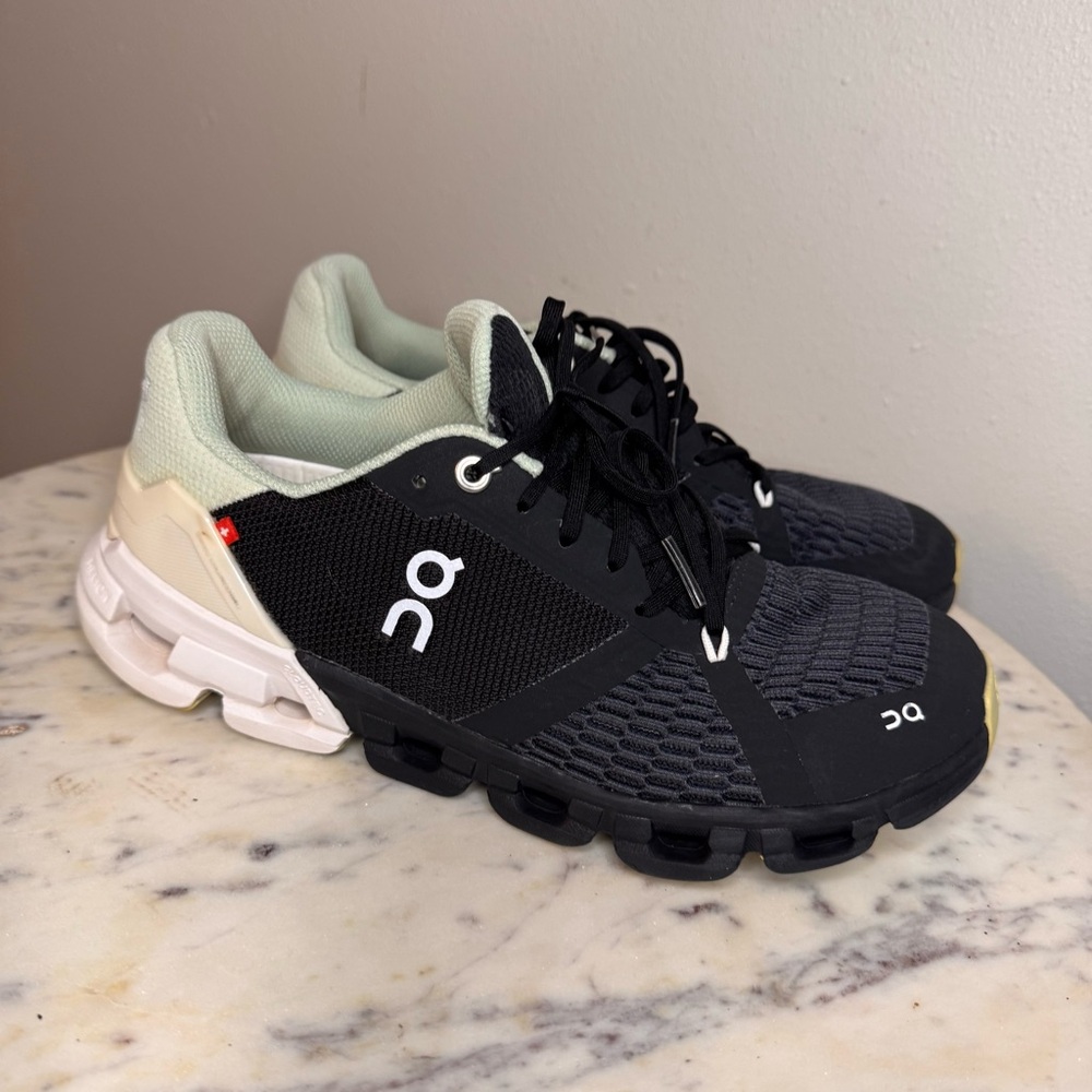 On Running Black and White Athletic Shoes
